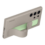 GETIT.QA- Qatar’s Best Online Shopping Website offers SAMSUNG GALAXY S24 ULTRA STANDING GRIP CASE, TAUPE, EF-GS928CUEGWW at the lowest price in Qatar. Free Shipping & COD Available!