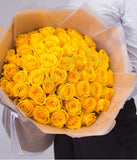 Get Roses en Jaune Hand Bouquet Price Online in Doha Qatar